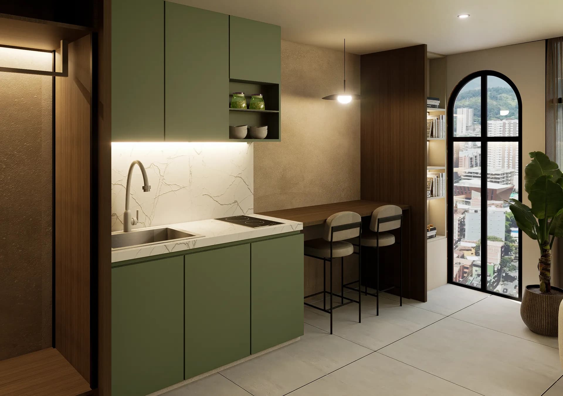 Cocina de una suite con gabinetes verde salvia, mármol claro y ventanal arqueado a la ciudad.